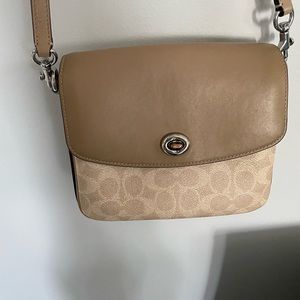 I am selling this Coach bag.I want to get rid of it fast make me an offer!